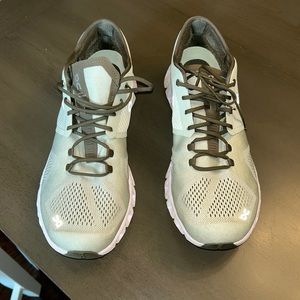 On running shoes. Size 12. Light sage color.